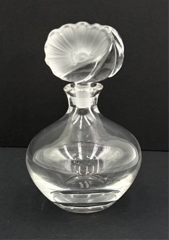 Marquis by Waterford Crystal Perfume Bottle: Marquis by Waterford crystal perfume bottle. Frosted flower stopper. In excellent condition with no chips or cracks. Approximately 4"h. Photos are considered part of the condition and description. 600