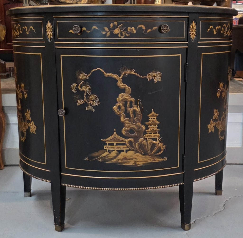Vintage Imperial Chinoiserie Demi Lune Cabinet: Vintage Imperial Grand Rapids Michigan chinoiserie black lacquer demi-lune cabinet. Features 1 door and 1 drawer. Some scratches and wear to top. Approximately 32"h x 36"w x 16"d. Photos are considere