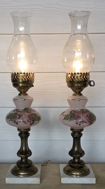 Pr. Vintage Hand Painted Electrified Oil Lamps: Pair of vintage electrified oil lamps. Hand painted floral design. Brass stands on marble bases. In working condition. Approximately 21.5"h. Photos are considered part of the condition and description