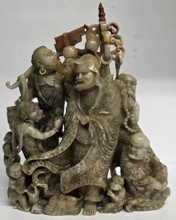 Vintage Chinese Carved Shoushan Stone Sculpture: Vintage Chinese carved Shoushan stone, a type of soapstone, sculpture. Features intricate hand carved figures. Approximately 12"h. Photos are considered part of the condition and description. O/S.