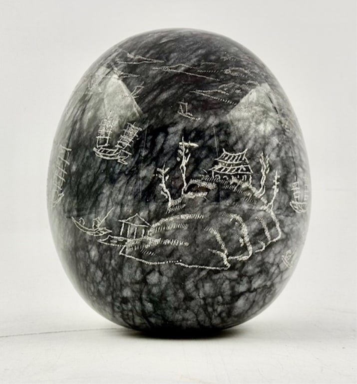 Large Etched Black & White Marble Egg: Large etched black and white marble egg. Features intricate carvings and etching on exterior. Approximately 7"h x 5"w. Photos are considered part of the condition and description. 619-26