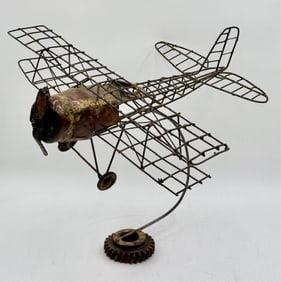 Handcrafted Metal Biplane Sculpture