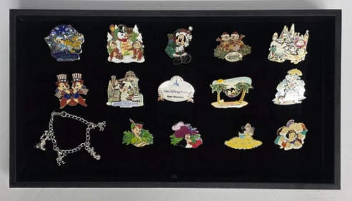 Collection of Assorted Walt Disney Pins & Bracelet