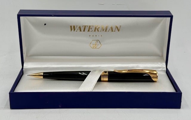 Waterman Etalon Black Mechanical Pencil: Waterman Etalon black mechanical pencil. Cap twist lead advance. French made. Pencil in mint condition with original box. Box approximately 1.5"h x 7"l x 2.5"d. Photos are considered part of the condi