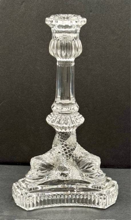 Tiffany & Co. Crystal Dolphin Candlestick Holder: Tiffany & Co. crystal candlestick holder. Features 3 neoclassical dolphins. In excellent condition with no chips or cracks. Approximately 8"h. Photos are considered part of the condition and descripti