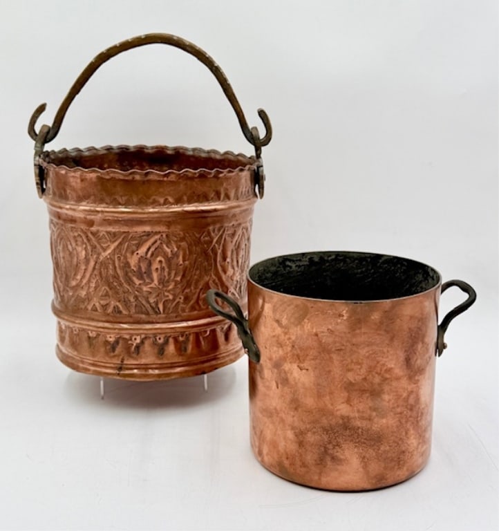 Pair of Vintage Copper Pots: Pair of vintage copper pots. Includes hand tooled hammered pail and double handled stock pot/cauldron. Some patina present. Pail approximately 8"h (12.5" with handle) x 8"w and stock pot approximately
