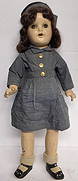 Antique Composition Baby Doll: Antique composition doll with original U.S. military style clothing. Head, arms, legs and body are composition. Glass? eyes. In good condition for age with some cracks present. Approximately 20" tall.