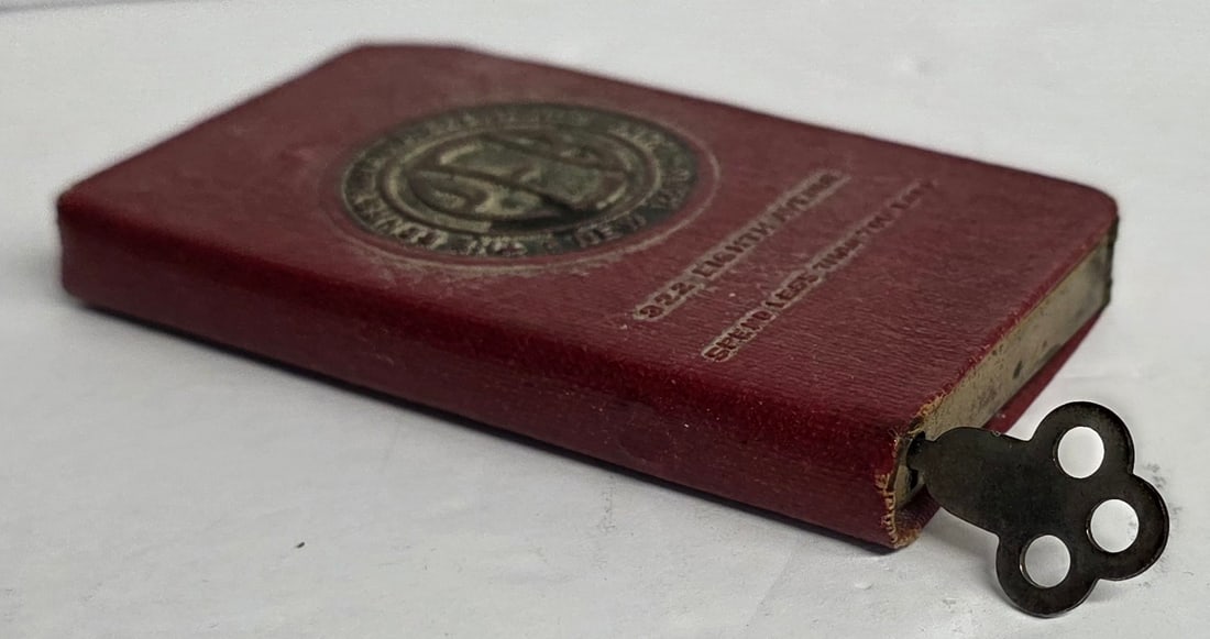 "The Pennsylvania Exchange" Metal Savings Bank: Vintage American Tobacco Company "The Pennsylvania Exchange Bank -New York" metal savings bank. Includeskey. In good condition for age with some minor age wear and worn corners and edges.