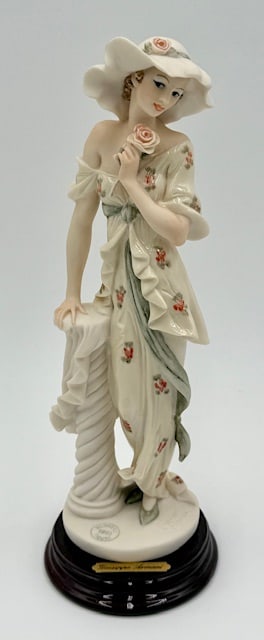 Giuseppe Armani "Lady Rose" Porcelain Figure: Giuseppe Armani "Lady Rose" porcelain figurine. 1993 Florence collection. Figure features both matte and glossy finish. Mounted on wood base. In excellent condition with no chips or cracks. Approximat