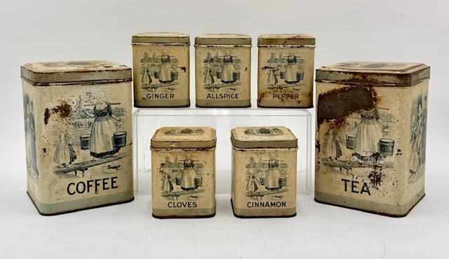 J.L. Clark Mfg. Co "Old Dutch" Canister Set: Vintage J.L. Clark Mfg. Co "Old Dutch" tin canister set. Set includes 7 total tins; 2 large tins, 6"h x 4"sq, tea and coffee, and 5 small tins, 3.5"h x 2.25"sq, ginger, all spice, pepper, cloves, and