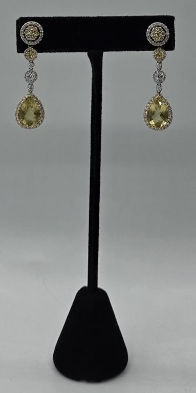 18k Diamond and Citron(?) Earrings - 9.63g TW: 18k Diamond and yellow stone earrings - possibly citron. Approx. 1.5"L. 9.63gTW. Assorted size round cut prong set diamonds and teardrop shape yellow stone set in white and yellow gold. Photos are con