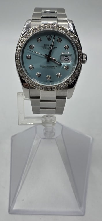 Rolex Datejust Stainless Steel 36mm Wristwatch: Rolex Datejust 36mm wristwatch. Watch features light blue dial, date magnifier, diamond hour markers, and diamond bezel. Stainless steel. Oyster band. No box included. Photos are considered part of th