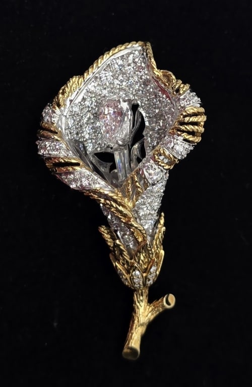 Stunning 18k & Platinum Diamond Lily Brooch 21.49g: Stunning 18k yellow gold and platinum diamond calla lily brooch. Floating stamen feature baguette diamond capped with large pear shaped diamond. Pierced open work design back. Approximately 2.25"h x 1