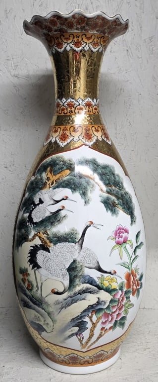 Vintage Hand Painted Chinese Porcelain Vase: Large vintage Chinese porcelain vase. The main body is decorated with hand painted images of pink and white lotus flowers and birds. Fluted rim and gold colored neck and base. Some minor nicks and wea