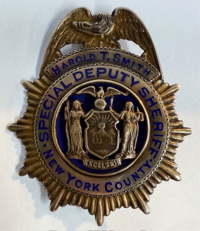10k New York County Sheriff Badge - 19.7g: 10k Solid gold law enforcement badge. 19.7g. Special Deputy Sheriff - New York County - Harold T. Smith. Marked Louis Markowitz Solid Gold. Approx. 2"H x 1.75"W. Photos are considered part of the