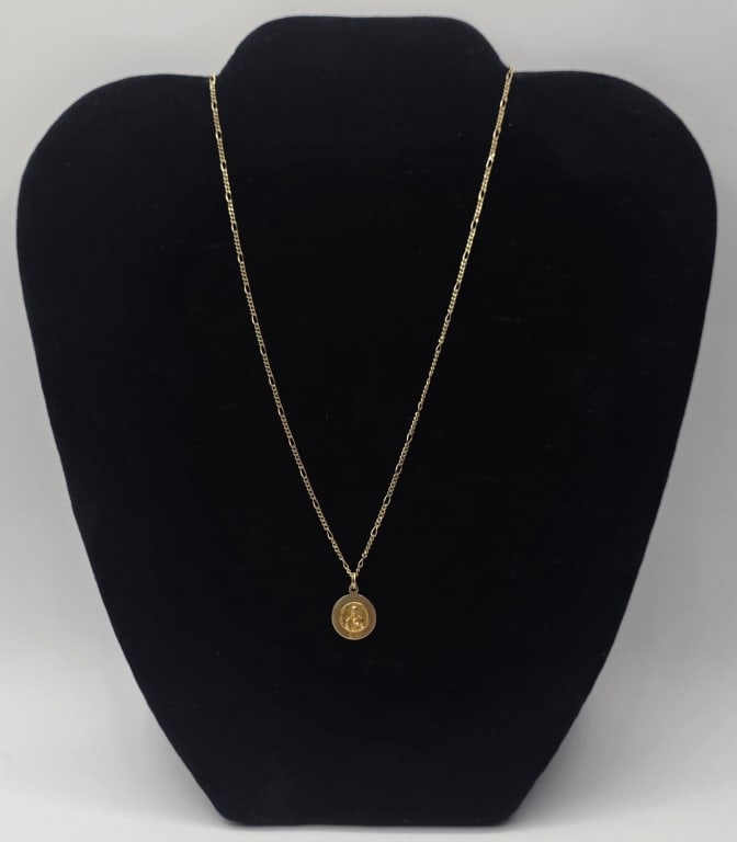 14k Holy Scapular Reversible Pendant Necklace: 14k Holy Scapular reversible pendant on chain. Pendant border is engraved with the words "O QUEEN OF THE HOLY SCAPULAR PRAY FOR US" and an image of the Sacred Heart of Jesus is on the opposing