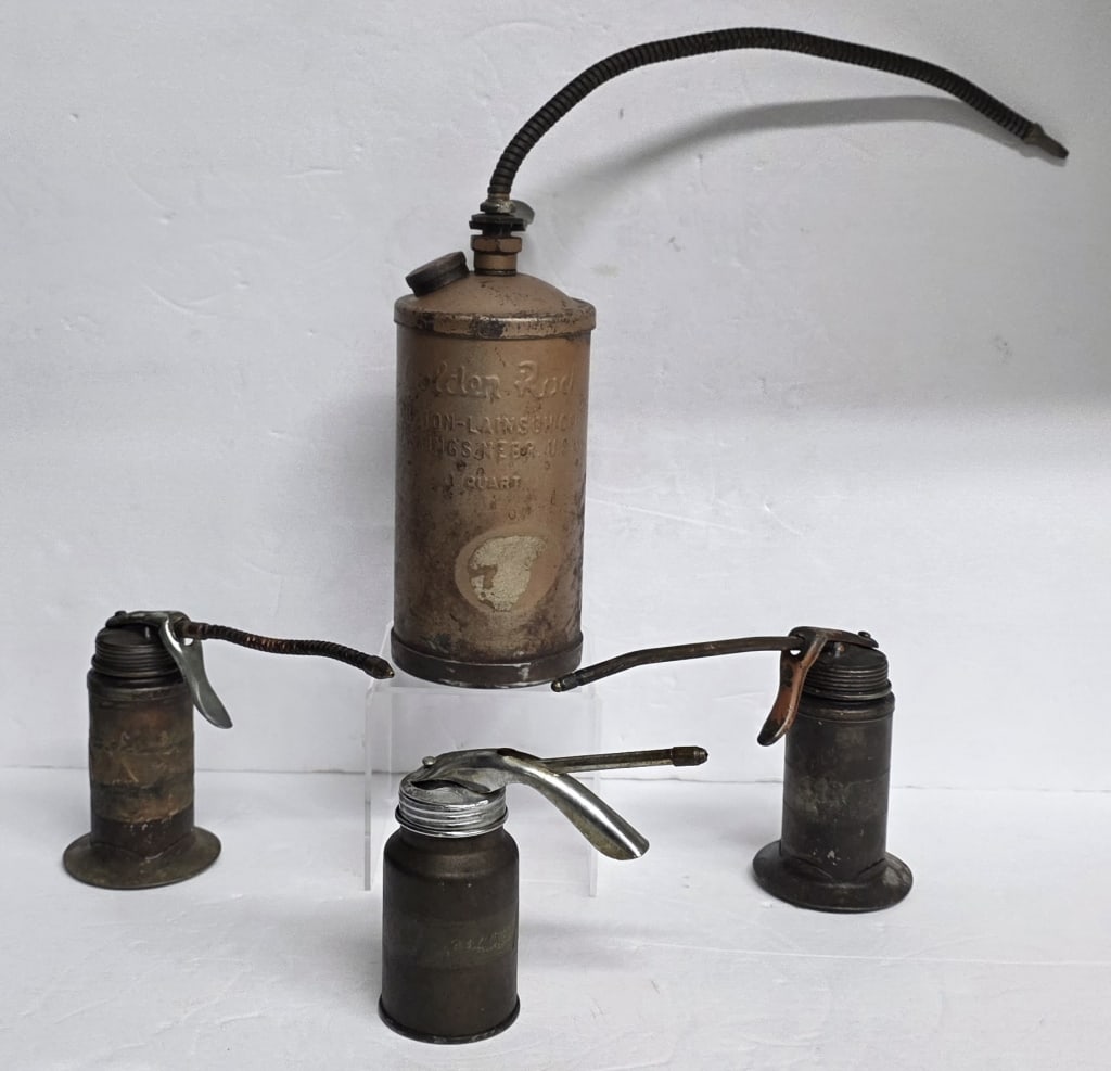 Collection of Vintage Oilers & Fumigators: Collection of four vintage oilers and fumigators. Includes Goldenrod heavy duty pump oiler and three unmarked. Sizes and shapes vary from 5" to 10.5"h. Photos are considered part of the condition and
