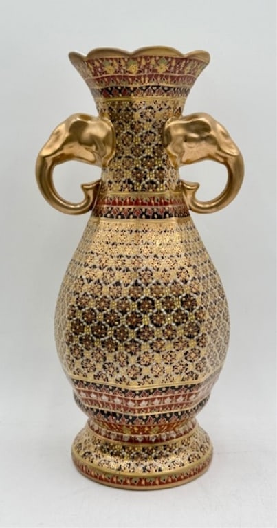Elephant Handle Thai Benjarong Gilded Vase: Beautiful elephant handle Thai Benjarong gilded golden vase. Vase features hand painted traditional Thai patterns in multiple colors. No chips or cracks. Approximately 13"h. Photos are considered part