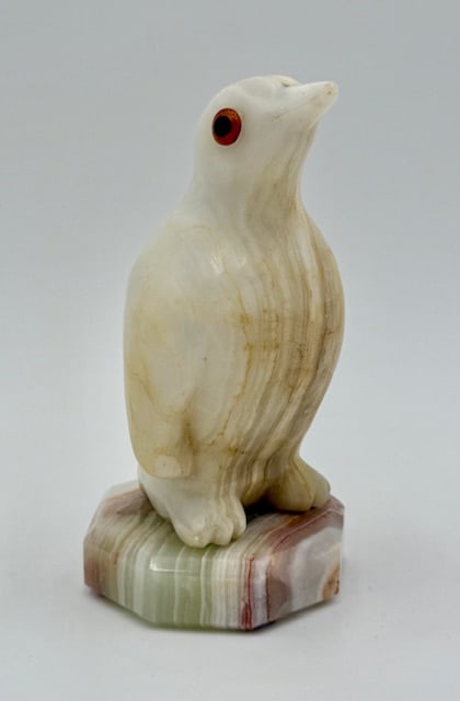 Vintage Carved Onyx Penguin on Stand: Vintage carved onyx penguin on stand. Penguin features applied eyes and separate stand. Approximately 6.5"h x 3"w on stand. Photos are considered part of the condition and description. 505-24
