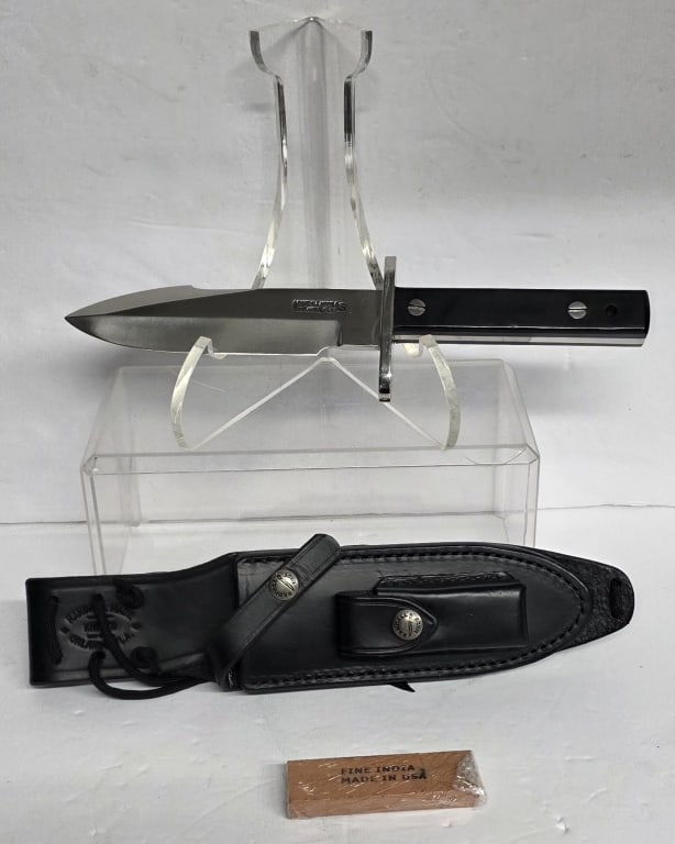 Randall Made Model 17 "Astro" Knife: Randall Made Model 17-"Astro" knife. Knife features stainless steel hilt and blade and silver soldered black Micarta handle fastened with removable stainless steel bolts. Accompanied by model C Randal