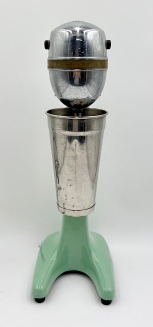 Hamilton Beach Drinkmaster No. 33 Milkshake Mixer: Vintage Hamilton Beach Drinkmaster No. 33 milkshake mixer. Produced in the 1930's and 1940's. Feature iconic mint green jadeite base and chrome motor housing. Works. Some pitting present on chrome. Se