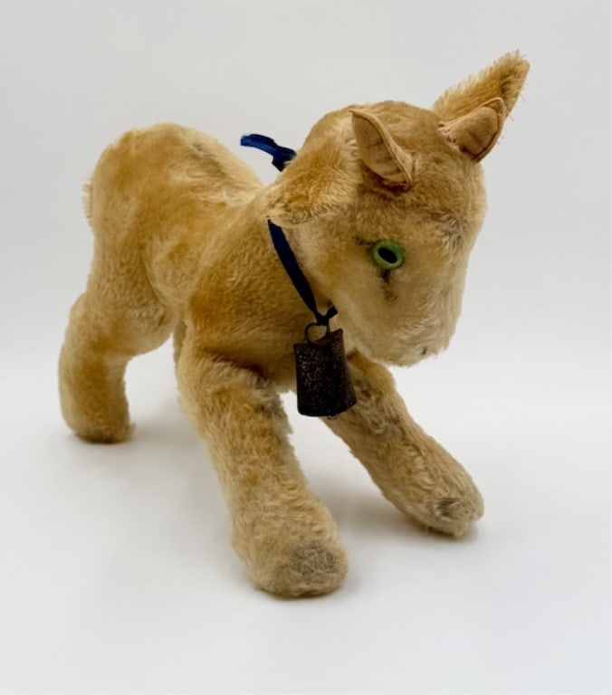 Vintage Steiff "Zicky" Goat Plush Toy: Vintage Steiff "Zicky" goat plush toy. Made of mohair with felt horns, inside ears, and underside of tail. Features blue ribbon with small bell attached. Button attached to ear but no tag. Approximate