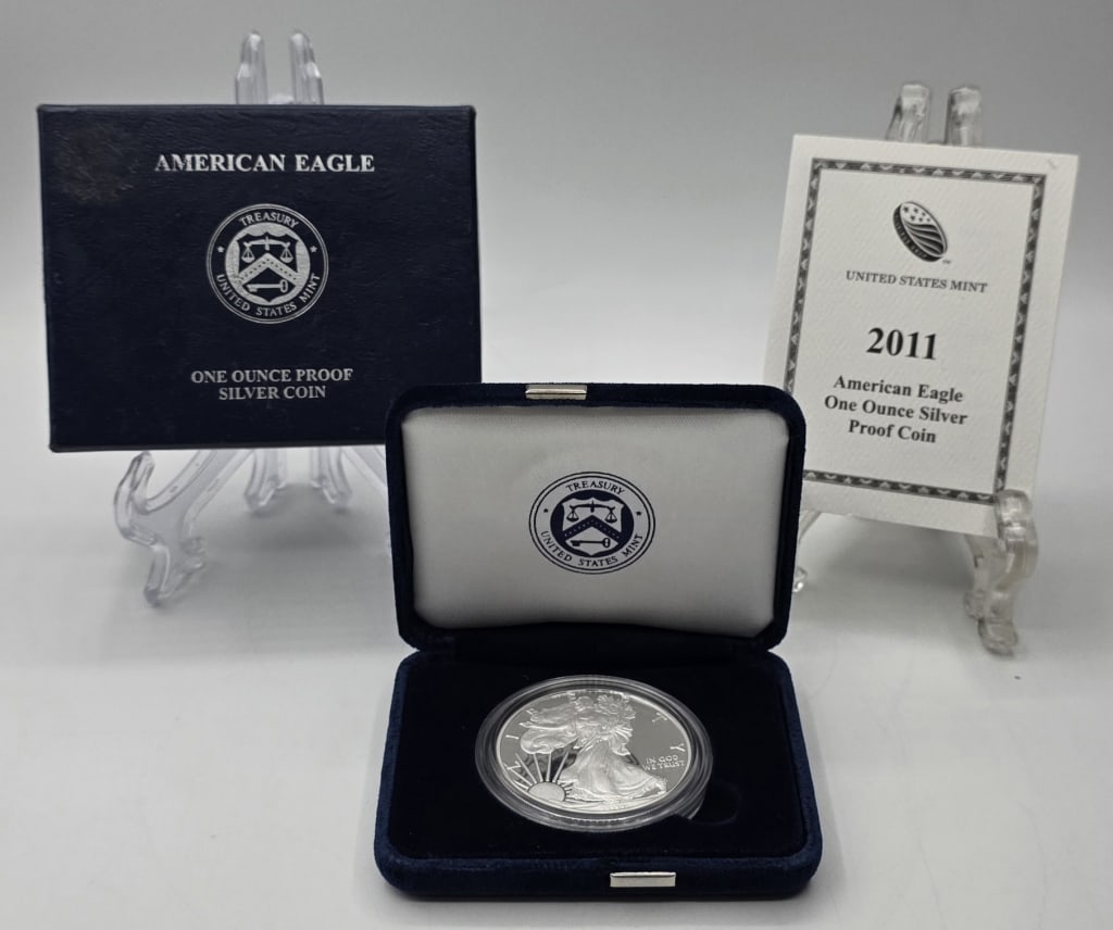 U.S. Mint 2011 American Eagle Silver Proof Coin: United States Mint 2011 American Eagle one ounce silver proof coin. Includes presentation box. Photos are considered part of the condition and description. R