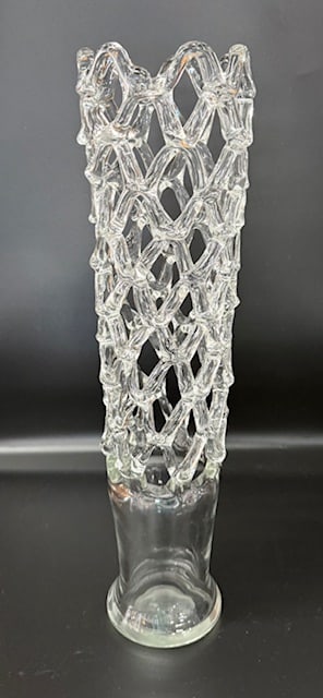 Vintage Hand Blown Glass Lattice Vase: Vintage hand blown glass lattice vase. Features an intricate hand blown lattice pattern made from pulled glass. In excellent condition with no chips or cracks. Approximately 19.75"h x 5.75"w.