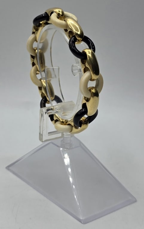 Rare Vtg Tiffany & CO 18kt Bone & Onyx Bracelet: Rare vintage Tiffany & Co 18k, bone, and onyx loop bracelet. Signed Tiffany & Co. 18k. Approx. 8"L. Bracelet has 9 heavy oval loops of 18kt gold, in addition to 5 bone and 4 onyx spacers. Signed on th