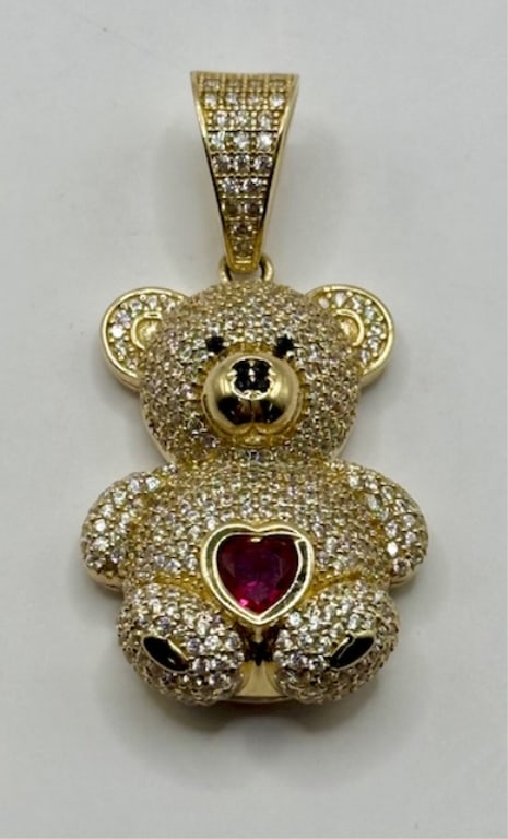 Adorable 14k Pave Stone Bear Pendant - 12.05g TW: Adorable 14k yellow gold pave stone bear pendant. Pink sapphire (?) heart in bear's belly. 12.05g TW. Approx. 1.75"H x 1"W. Open lattice back and pave stone bail. Photos are considered part of
