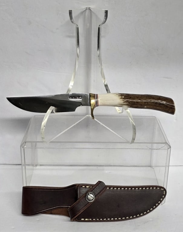 Randall Made "Denmark Special" Knife: Randall Made "Denmark Special" knife. Knife features raised point design, brass hilt, and stag handle. Small nick on handle. Accompanied by model B Randall made leather sheath. Made in Orlando, FI. Kn