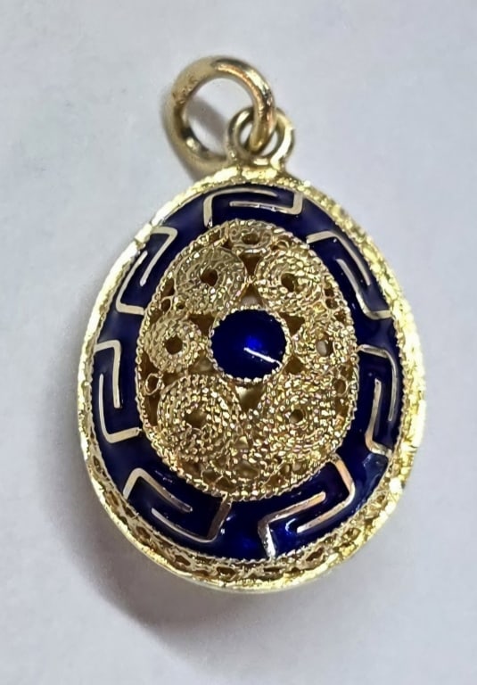 14k Filigree Egg Pendant - 5.73g TW: 14k Yellow gold filigree egg pendant. Pendant handcrafted in 14K solid yellow gold and decorated with kiln fired vitreous hot enamel in various colors. Approximately 1" x 5/8" and 5.73g TW.