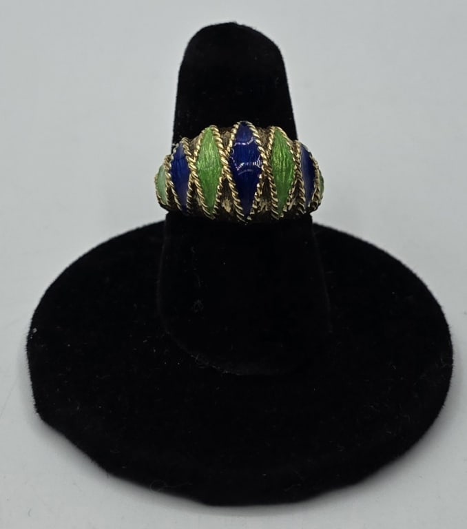 18k Blue & Green Enamel Dome Ring - 6.29g TW: 18k Blue and green enamel ring. Dome ring features a vibrant combination of blue and green enamel set within an 18K yellow gold band. The design is characterized by alternating vertical sections