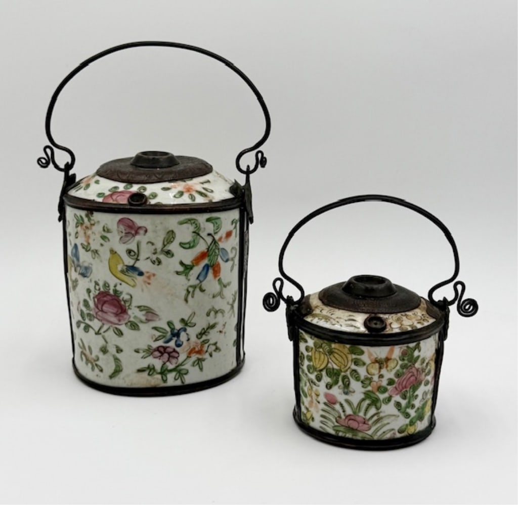 Pair of Vintage Hand Painted Opium Jars: Pair of vintage hand painted opium jars. Beautiful floral pattern with mounted metal handles and trim. In excellent condition for age with no cracks. Approximately 9.5"h x 5.5"w and 6"h x 5"w.