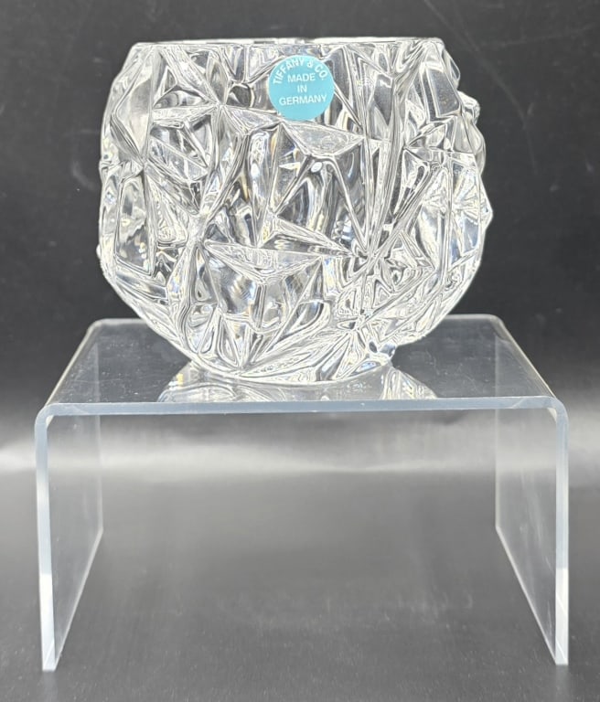 Tiffany & Co. Crystal Votive Candle Holder: Tiffany & Co. rock cut crystal votive candle holder. Features a classic rock cut geometric pattern. Made in Germany. Excellent condition with no chips or cracks. Approximately 3"h. Photos are consider