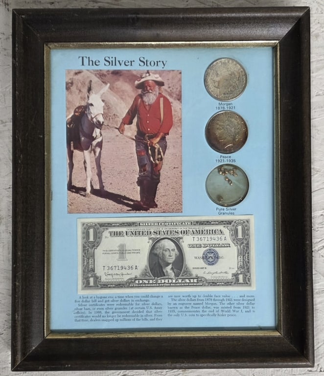 "The Silver Story" Framed Collectible Set: "The Silver Story" framed collectible set. Includes United States currency and silver granules. Approximately 12"h x 10"w. Photos are considered part of the condition and description. R