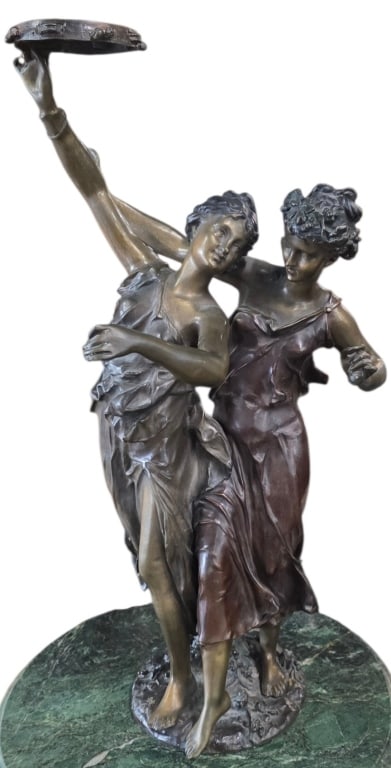 Etienne-Henri Dumaige Bronze "Tambourine Girls": "Tambourine Girls" bronze sculpture by Etienne-Henri Dumaige. Depicts two women dancing together, with one lifting a tambourine high in the air. Signed Etienne-Henri Dumaige and numbered 9/75. Approxi
