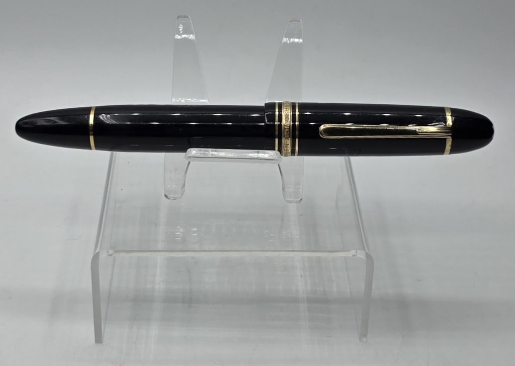 Montblanc Meisterstuck 149 LeGrand Fountain Pen: Vintage Montblanc Meisterstuck 149 LeGrand fountain pen. Crafted from black resin with gold coated fittings and a 14"C" 585 gold nib. Approximately 6" long. Photos are considered part of the condition