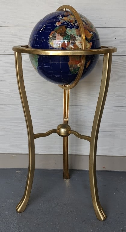 Blue Lapis Gemstone World Globe On Brass Stand: Beautiful blue lapis gemstone world globe. On brass tripod stand. Approximately 38"h x 18"W x 18"D. . Photos are considered part of the condition and description. 805-26