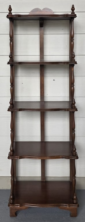 Victorian Style 5 Tier Carved Etagere: Victorian style 5 tier etagere. Features five open shelves supported by decorative turned spindle posts. Possible repair made to bottom finial post. Approximately 52.5"h x 17"w x 11"d. Photos are cons