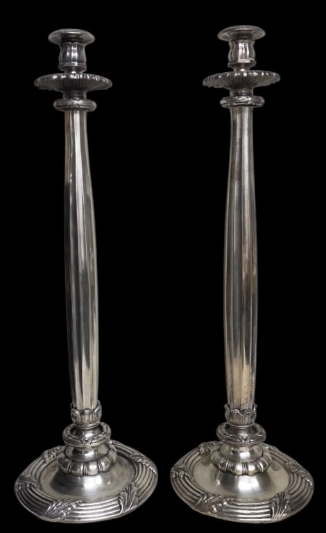 Pair of Global Views 24" Silverplated Candlesticks: Pair of Global Views 24" silverplate candlesticks. Candlesticks feature a tall, slender design with detailed bases. Made in India. Photos are considered part of the condition and description. 318-17