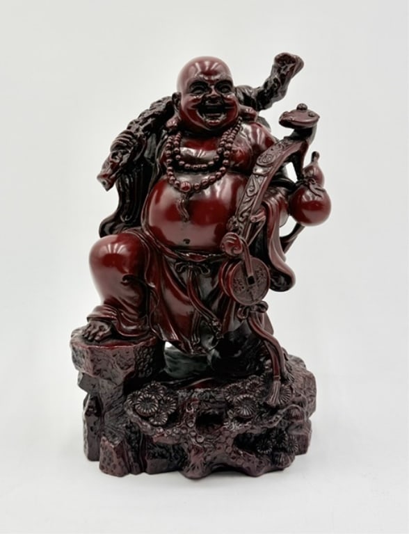 Red Laughing Buddha Statue: Red Laughing Buddha statue. Constructed from resin with a cinnabar red finish. Approximately 10"h x 6.5"w x 6.5"d. Heavy. Photos are considered part of the condition and description. 917-15