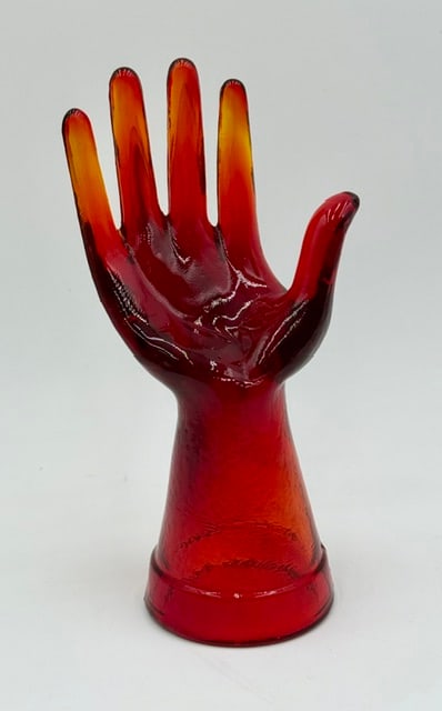 Vintage Red Amberina Glass Hand: Vintage red amberina glass hand. Designed to stand upright on a dresser or vanity so that rings can be slid onto the fingers and bracelets draped over the wrist. In excellent condition with no chips o
