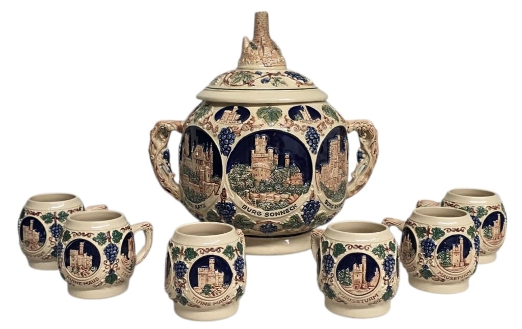 Vintage Gerz German Stoneware Punch Bowl Set: Vintage Gerz German salt glazed stoneware punch bowl set. Set features "Castles on the Rhine" design with intricate, colorful raised panels depicting historical landmarks. Includes 6 matching mugs. Ma