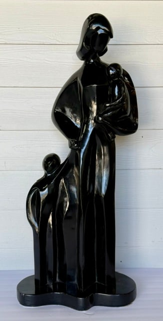Vintage MCM Ceramic Family Sculpture: Vintage MCM ceramic family sculpture. Modern sculpture depicts a mother with her two children finished in a high gloss jet black glaze. Felt lined bottom. Approximately 36.35"h x 16"w x 8"d. Photos ar