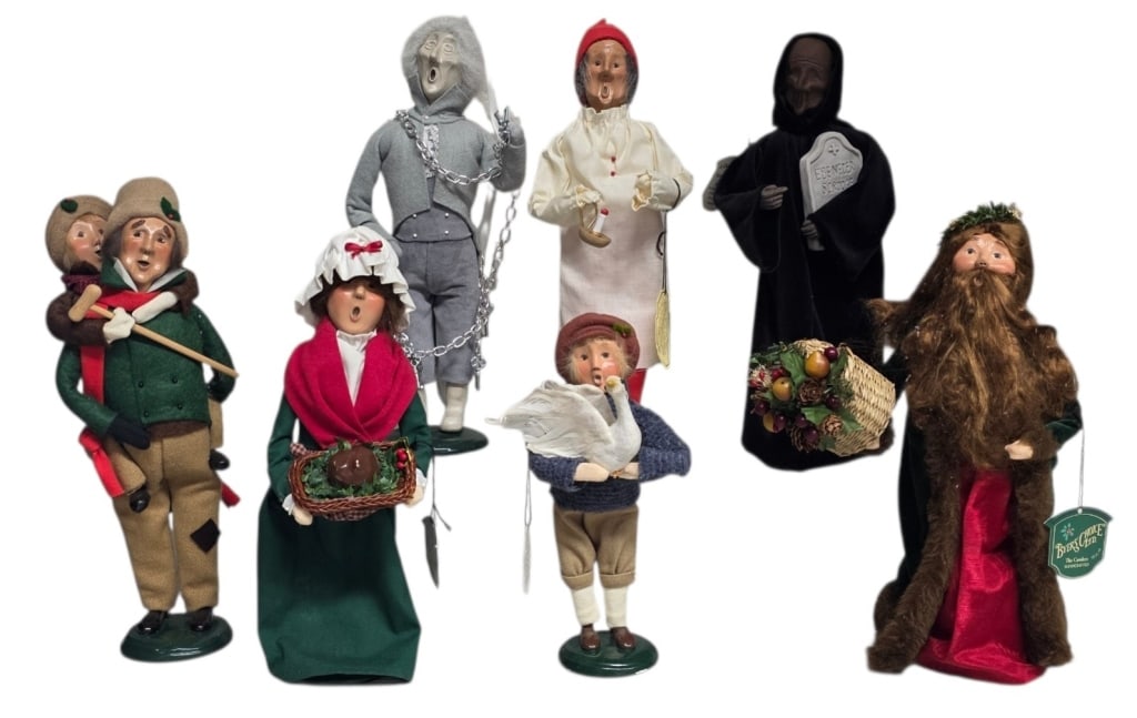 Byers' Choice "A Christmas Carol" Series Figurines: Collection of Byers' Choice carolers from their specialized "A Christmas Carol" series. Figures feature hand sculpted clay faces, expressive open singing mouths, and custom fabric clothing meticulousl