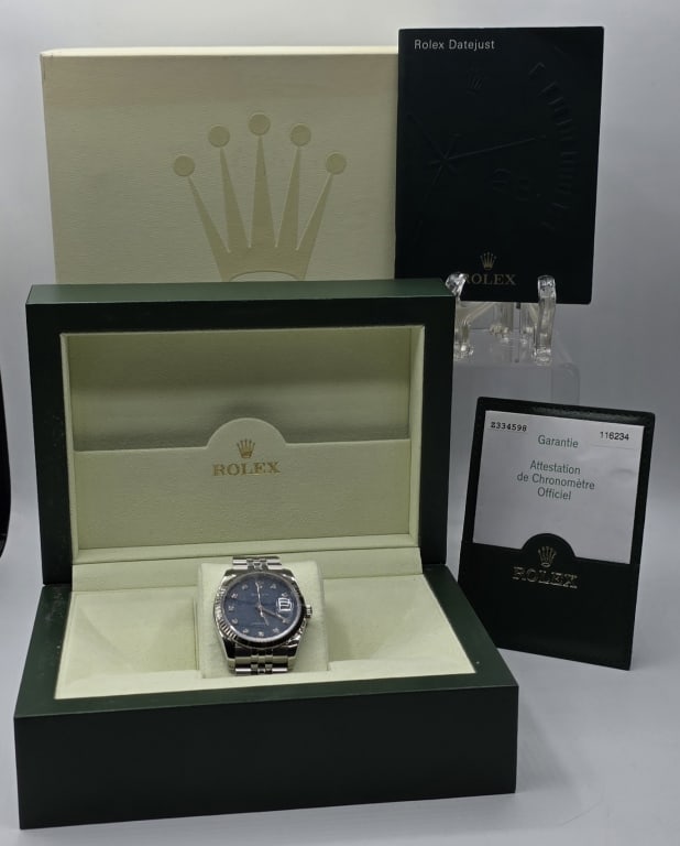 Rolex 36mm Datejust Wristwatch: 2011 Rolex 36mm Datejust wristwatch. Watch features original factory blue diamond dial, stainless steel and white gold case, and jubilee bracelet. Model number 116234, Serial number Z334598. Authentic