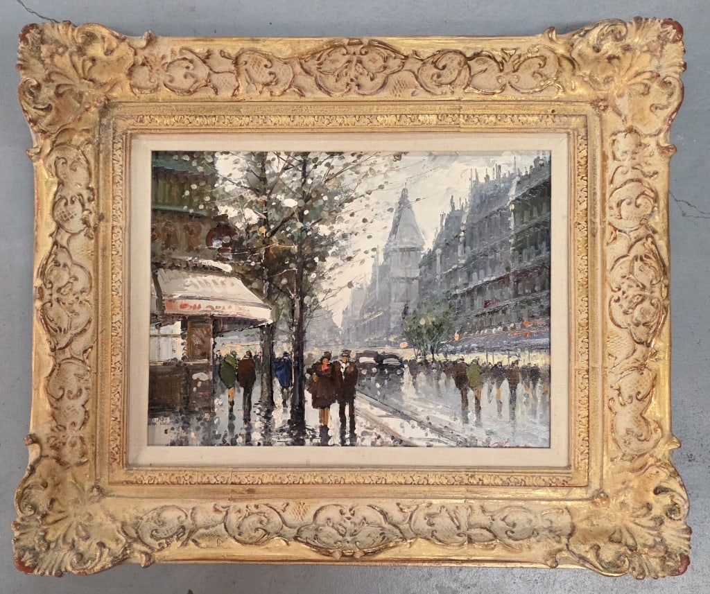 Lovely Parisian Street Scene Oil on Canvas: Lovely mid 20th century impressionist oil painting of a Parisian boulevard street scene. Canvas housed in an ornate gold wood frame. Artist signed. Approximately 20"h x 24"w. Photos are considered par