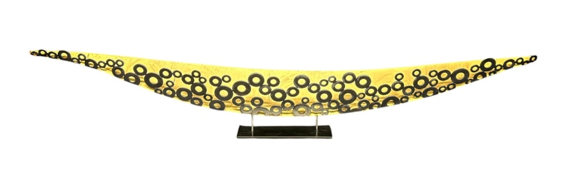 J. Girardini 'Boat with Many Holes' Sculpture: Julie and Ken Girardini "Boat with Many Holes" steel vessel sculpture. The sculpture is constructed from steel and features a intricate pattern of cutout circles across a gold leaf interior. Attached