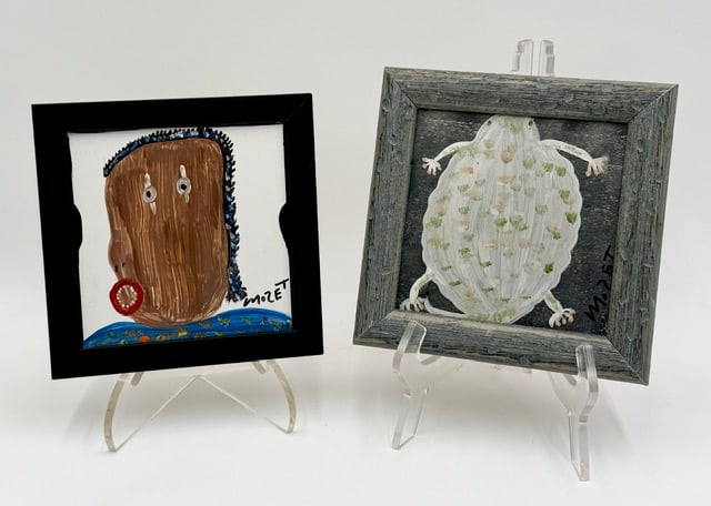 Pr. Mose Tolliver Framed Folk Art Paintings: Pair of Mose Tolliver framed folk art paintings. Includes 7 1/8" square portrait and 7 3/4" square frog?. Both paintings on tile and signed. Photos are considered part of the condition and description